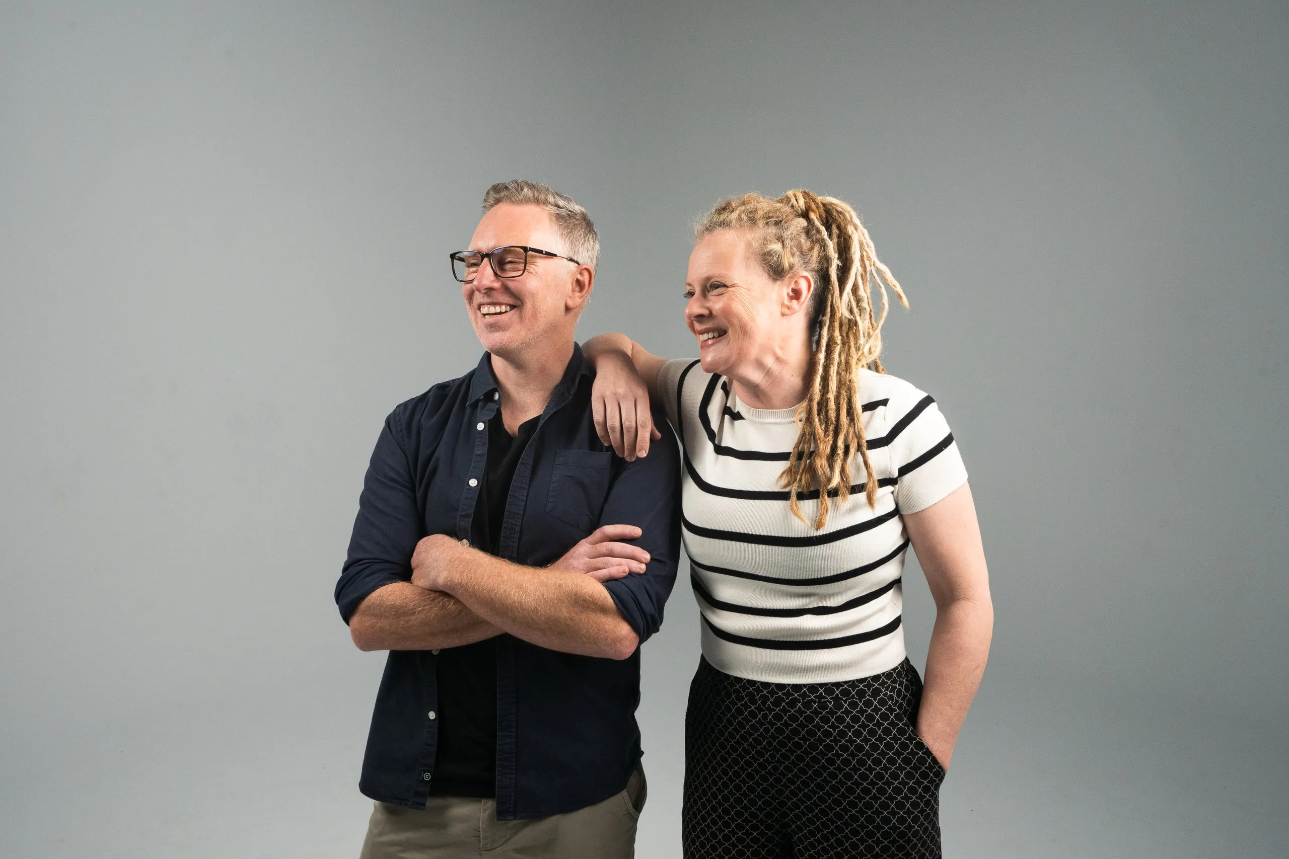 Tim and Jay Jeffries standing together, laughing
